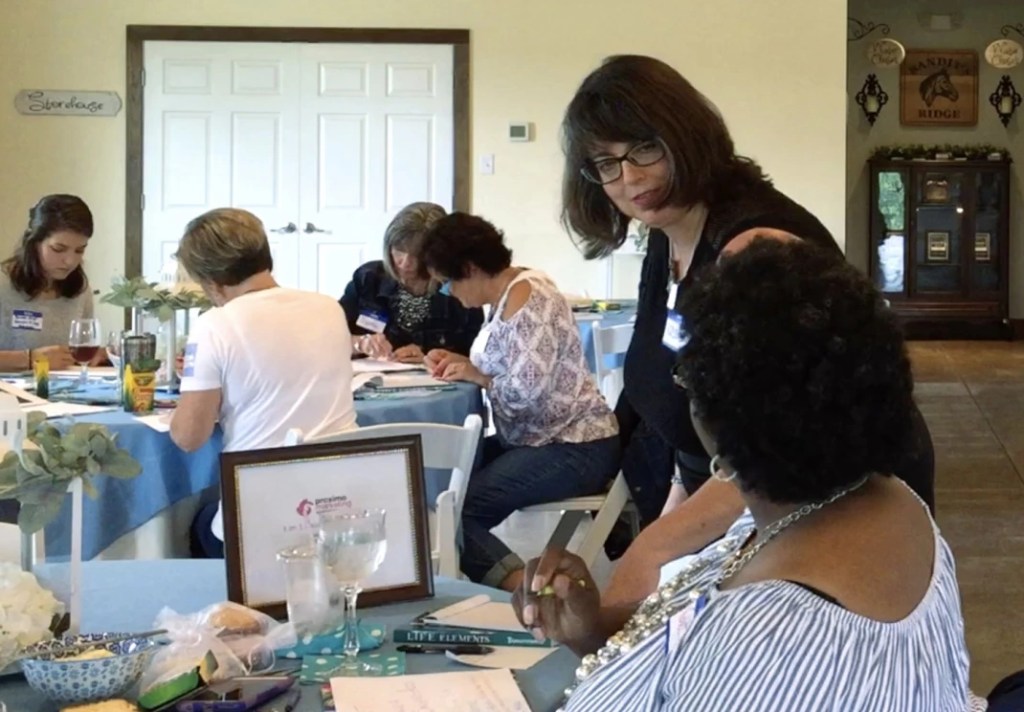 izolda helping a workshop participant